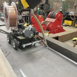 Submerged tractor arc welder