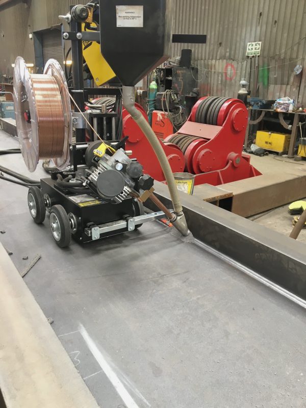 Submerged tractor arc welder